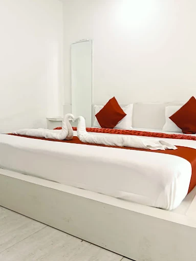 Room styled with swan towel art